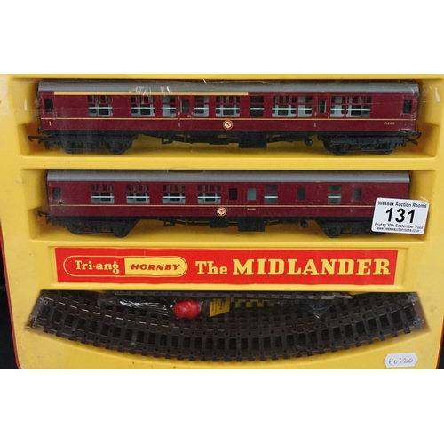 131 - Boxed and sealed Triang Hornby OO gauge The Midlander train set, some seal splits but ex overall, no... 