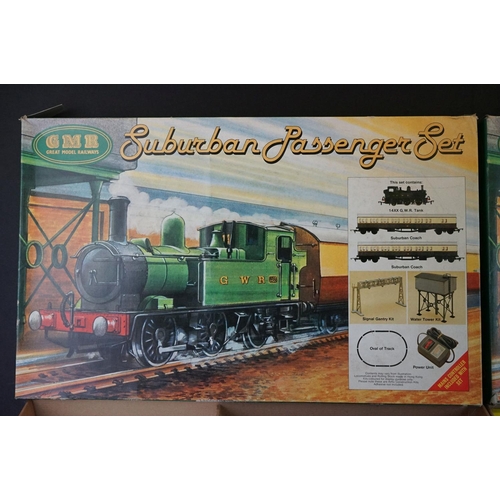 134 - Two boxed Airfix GMR OO gauge Suburban Passenger Sets, both with boxed locomotive and 2 x boxed coac... 