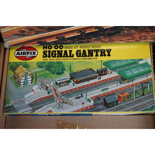 134 - Two boxed Airfix GMR OO gauge Suburban Passenger Sets, both with boxed locomotive and 2 x boxed coac... 