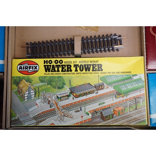 134 - Two boxed Airfix GMR OO gauge Suburban Passenger Sets, both with boxed locomotive and 2 x boxed coac... 