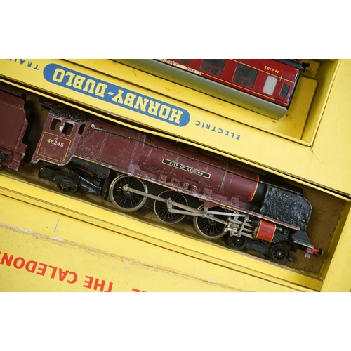 136 - Two boxed Hornby Dublo train sets to include 2022 The Caledonian Passenger Train containing City of ... 