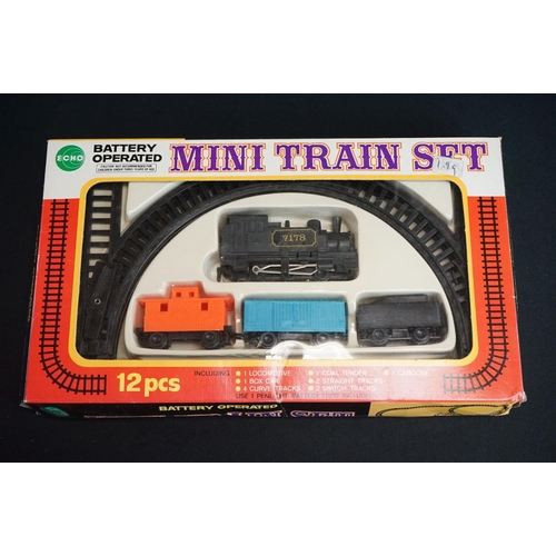 139 - Seven boxed train sets to include Echo Battery Operated Mini Train Set, Maisto Power On Track, New R... 