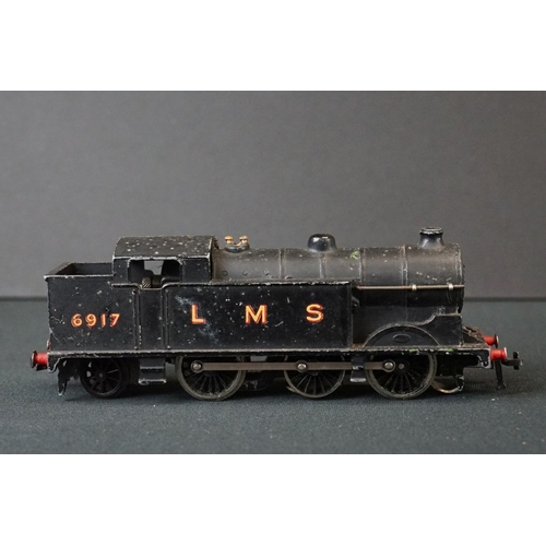 141 - Four Hornby Dublo locomotives to include 0-6-2 LNER 9596, D3763, 0-6-2 LMS 6917 and 2-6-4 180059 BR ... 