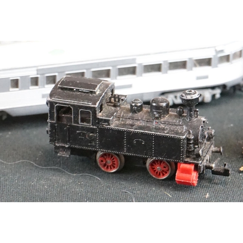 182 - Quantity of N gauge model railway to include Fleischmann locomotive, rolling stock, tracks, spares a... 