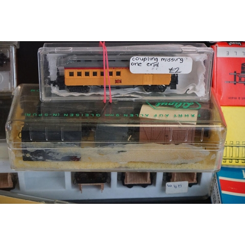 182 - Quantity of N gauge model railway to include Fleischmann locomotive, rolling stock, tracks, spares a... 