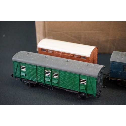 197 - Around 65 OO gauge items of rolling stock to include many kit built examples featuring wagons, tanke... 