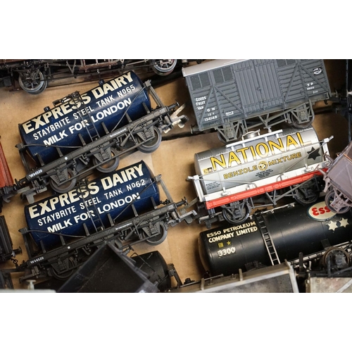 197 - Around 65 OO gauge items of rolling stock to include many kit built examples featuring wagons, tanke... 