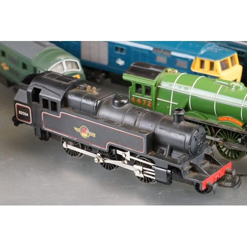 51 - 15 OO / HO gauge locomotives to include Hornby Flying Scotsman, Hornby Western Courier, Lima Western... 