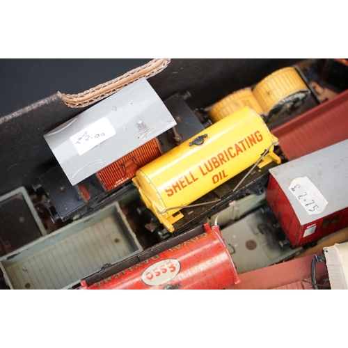 62 - Around 70 Hornby Dublo items of rolling stock to include coaches, wagons and tankers