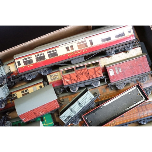 62 - Around 70 Hornby Dublo items of rolling stock to include coaches, wagons and tankers