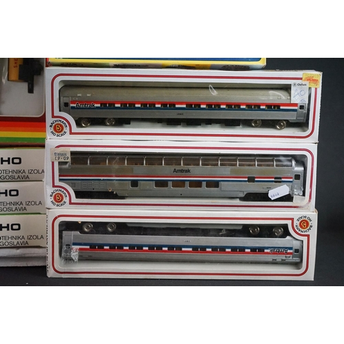 66 - Around 55 Boxed HO gauge items of rolling stock to include 25 x Life-Like Train, 5 x Bachmann, 7 x I... 