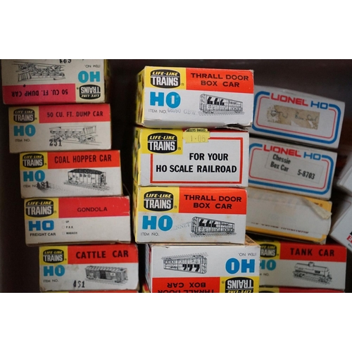 66 - Around 55 Boxed HO gauge items of rolling stock to include 25 x Life-Like Train, 5 x Bachmann, 7 x I... 