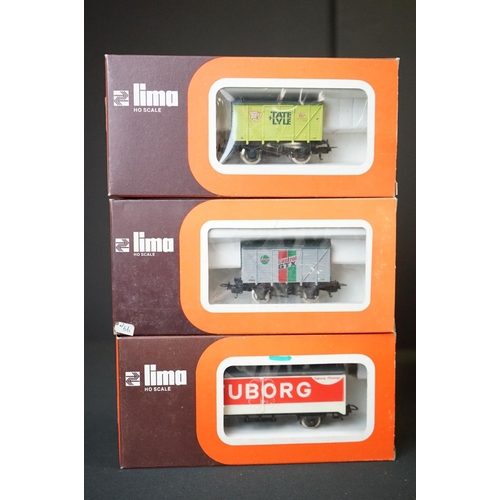 69 - 30 Boxed Lima OO / HO gauge items of rolling stock to include coaches and wagons