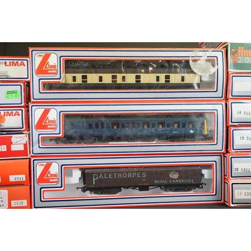 69 - 30 Boxed Lima OO / HO gauge items of rolling stock to include coaches and wagons