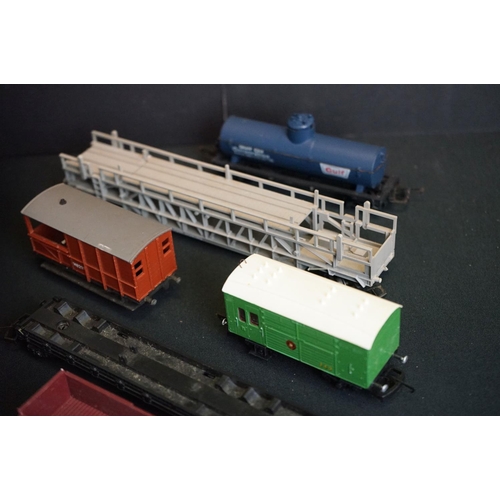 72 - Around 65 OO gauge items of rolling stock to include Triang, Jouef, Hornby etc, featuring wagons, co... 