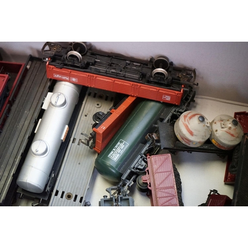 72 - Around 65 OO gauge items of rolling stock to include Triang, Jouef, Hornby etc, featuring wagons, co... 