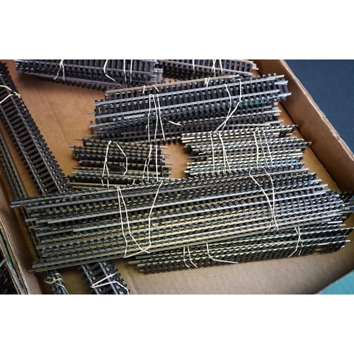 201 - Quantity of OO gauge model railway track featuring various straights and curves, separated into sets... 