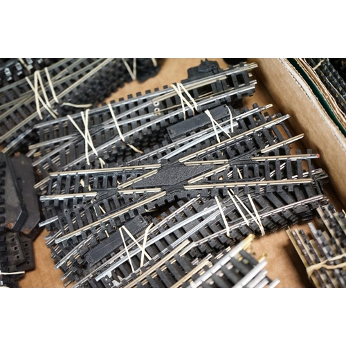 201 - Quantity of OO gauge model railway track featuring various straights and curves, separated into sets... 