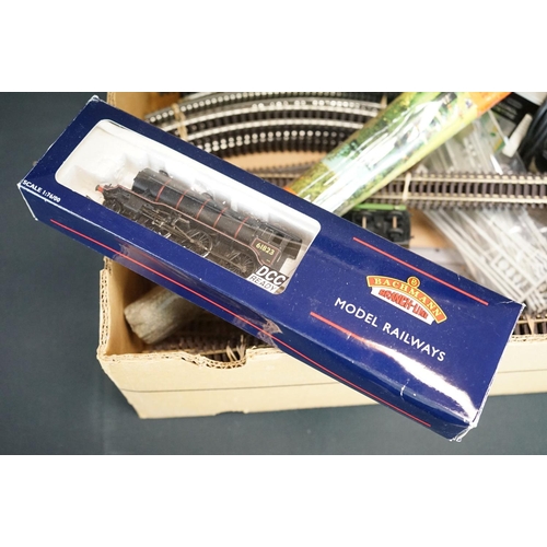 83 - Quantity of OO gauge model railway accessories to include boxed locomotives, scenery, trackside buil... 