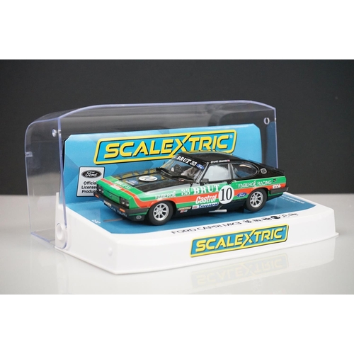 1034 - Five cased Scalextric slot cars to include C4238 Austin Mini Cooper S Broadspeed, C4166 Aston Martin... 