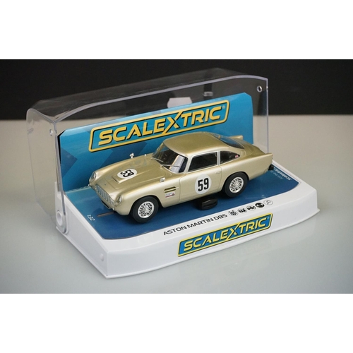 1034 - Five cased Scalextric slot cars to include C4238 Austin Mini Cooper S Broadspeed, C4166 Aston Martin... 