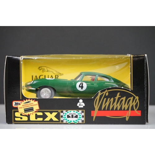 1041 - Five boxed / cased slot cars to include Classic Grand Prix C2552 Vanwall F1 1957 No10, Chevrolet Cam... 