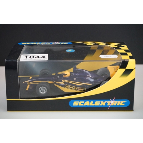 1044 - Six cased / boxed Scalextric slot cars to include C2516 Dallara Indy Mobil 1 No5, C2517 Gulf No 4, C... 