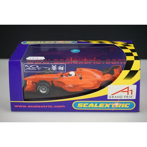 1045 - Four cased / boxed Scalextric slot cars to include C2708 A1 Grand Prix Team Netherlands, C2709 A1 GP... 