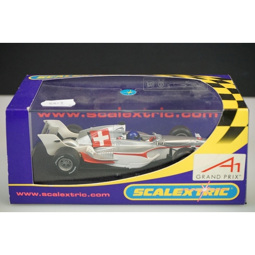 1045 - Four cased / boxed Scalextric slot cars to include C2708 A1 Grand Prix Team Netherlands, C2709 A1 GP... 