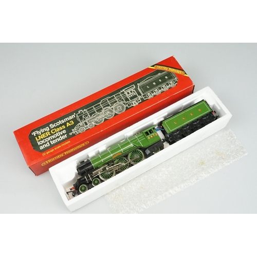 250 - Four boxed Hornby OO gauge locomotives to include R855 LNER Flying Scotsman, R068 BR Class 25 Diesel... 