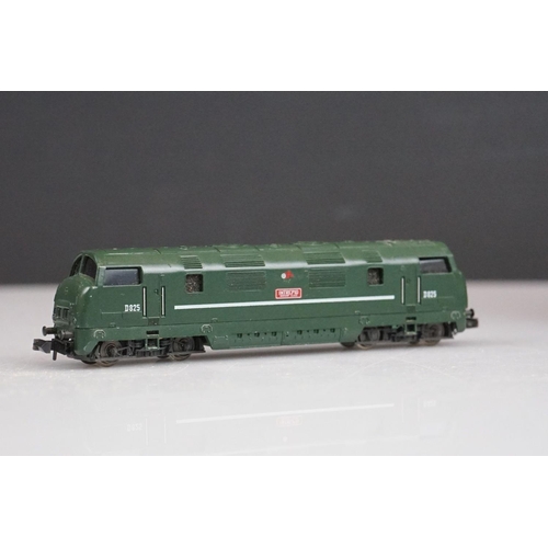 256 - Four N gauge locomotives to include a cased Fleischmann 8336, & Trix Intrepid plus a cased Arnold 46... 