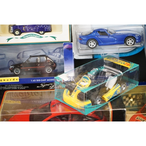 1133 - Around 35 boxed/carded/cased diecast models to include Maisto, Corgi, Matchbox, Majorette etc, dieca... 