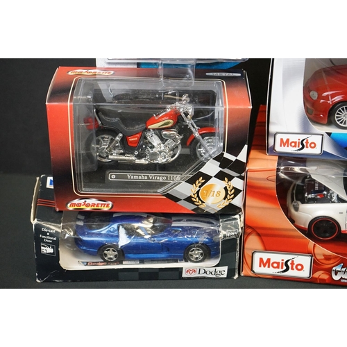 1133 - Around 35 boxed/carded/cased diecast models to include Maisto, Corgi, Matchbox, Majorette etc, dieca... 