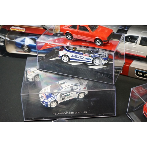 1133 - Around 35 boxed/carded/cased diecast models to include Maisto, Corgi, Matchbox, Majorette etc, dieca... 