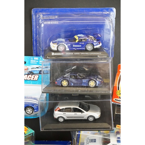 1133 - Around 35 boxed/carded/cased diecast models to include Maisto, Corgi, Matchbox, Majorette etc, dieca... 