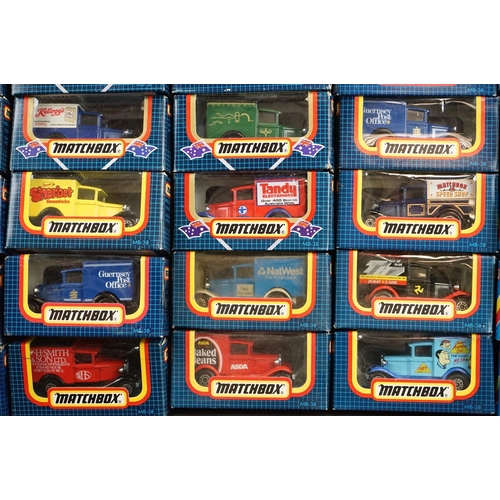 1135 - Over 55 boxed Matchbox diecast models circa early 1980s to include blue boxes with yellow/red stripe... 