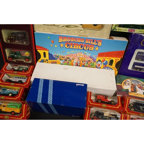 1160 - 26 Boxed Diecast models to include 11 x Lledo promotional vehicles (featuring Models of Famous Store... 