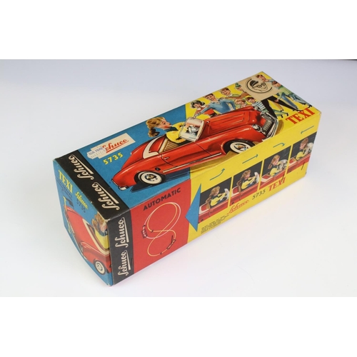 1255 - Original boxed Schuco 5735 Texi tin plate model in red male driver with driver in yellow cap, 3 x wo... 