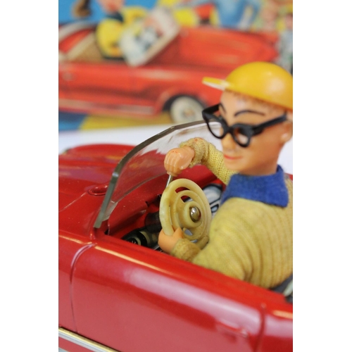 1255 - Original boxed Schuco 5735 Texi tin plate model in red male driver with driver in yellow cap, 3 x wo... 