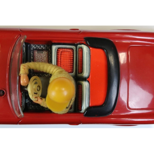 1255 - Original boxed Schuco 5735 Texi tin plate model in red male driver with driver in yellow cap, 3 x wo... 