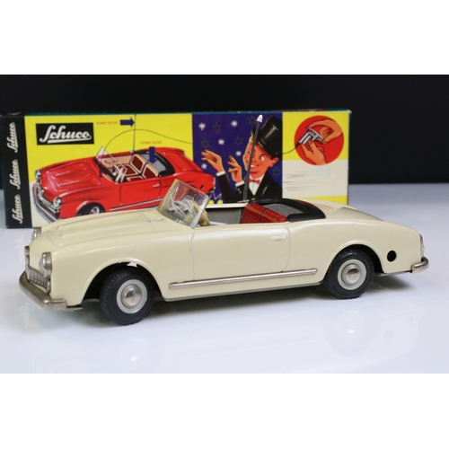 1256 - Original boxed Schuco 2010 Magico tin plate Alfa Romeo model in off white with red interior, with ke... 