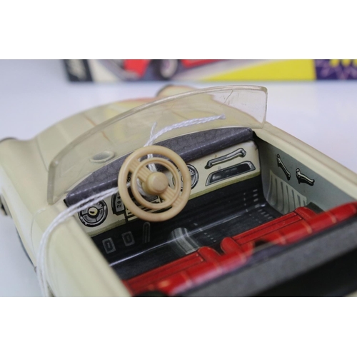 1256 - Original boxed Schuco 2010 Magico tin plate Alfa Romeo model in off white with red interior, with ke... 