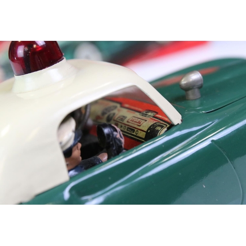 1257 - Original boxed Schuco Elektro Razzia Car 5509 tin plate model in evergreen with cream hood, with ins... 