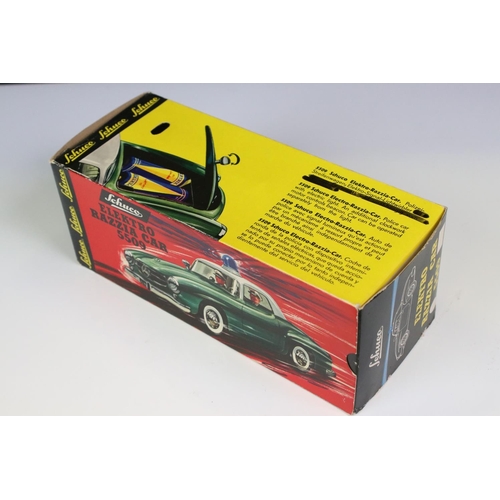 1257 - Original boxed Schuco Elektro Razzia Car 5509 tin plate model in evergreen with cream hood, with ins... 