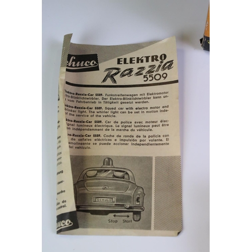 1257 - Original boxed Schuco Elektro Razzia Car 5509 tin plate model in evergreen with cream hood, with ins... 