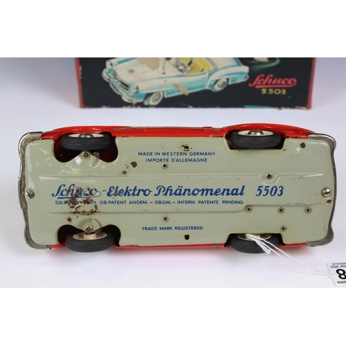 1258 - Original boxed Schuco 5503 Elektro Phanomenal tin plate car in red with 4 x wooden pegs & remote con... 