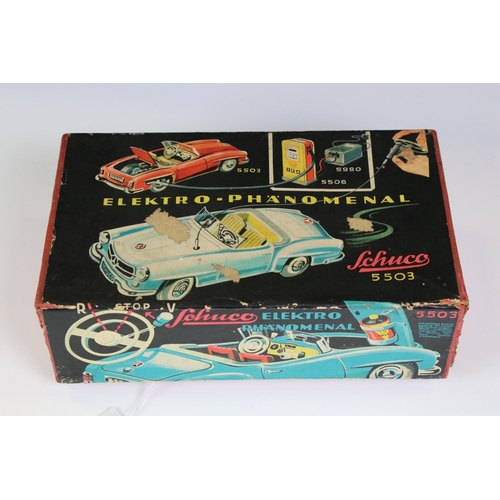 1258 - Original boxed Schuco 5503 Elektro Phanomenal tin plate car in red with 4 x wooden pegs & remote con... 