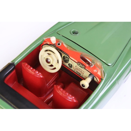 1261 - Original boxed Schuco 5503 Elektro Phanomenal Mercedes 190 SL tin plate car in green with red interi... 