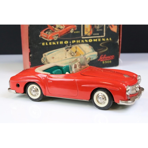 1262 - Original boxed Schuco 5503 Elektro Phanomenal tin plate car in red complete with 6 x wooden pegs, re... 