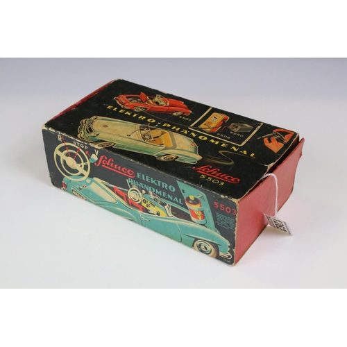 1262 - Original boxed Schuco 5503 Elektro Phanomenal tin plate car in red complete with 6 x wooden pegs, re... 